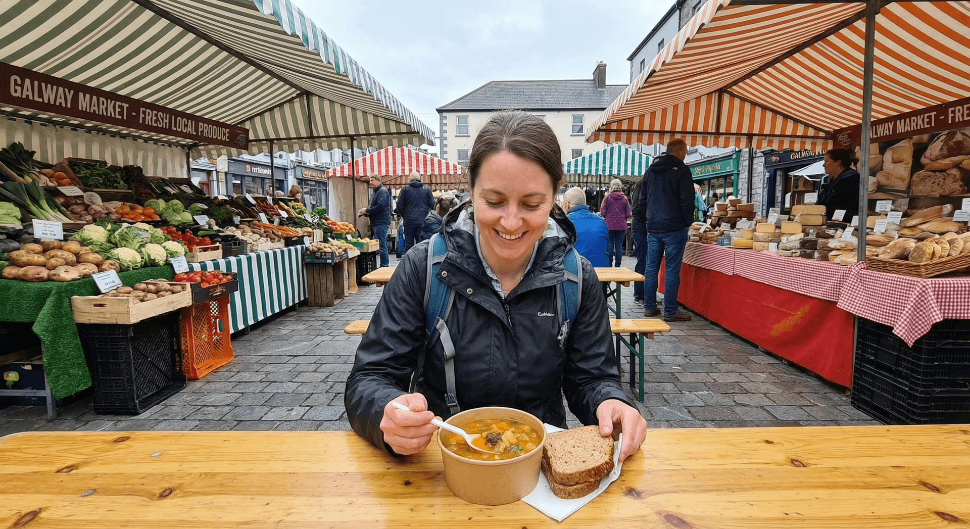 Solo traveler enjoying affordable lunch at farmers market in Galway