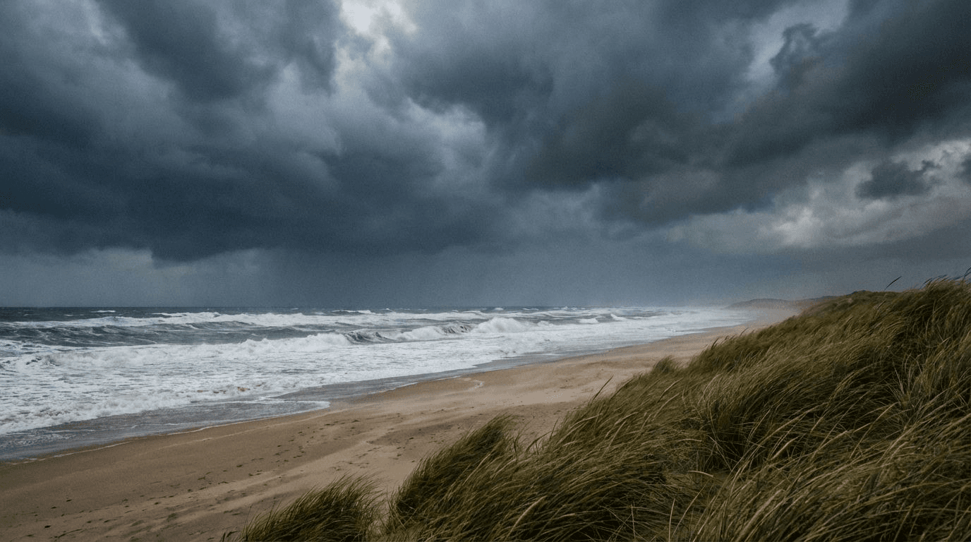 Empty Curracloe Beach in autumn with dramatic storm clouds, waves crashing, wild atmospheric conditions