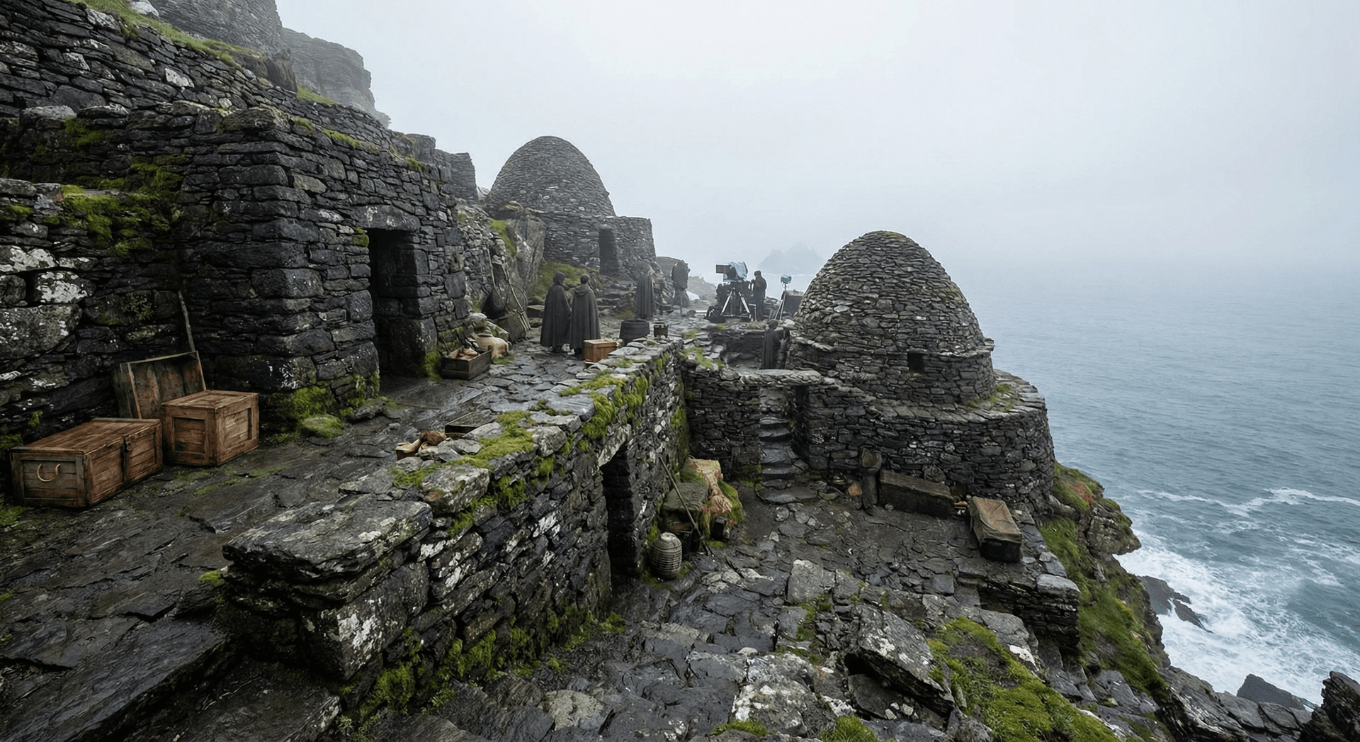 Movie set stone structures among ancient beehive huts on Skellig Michael