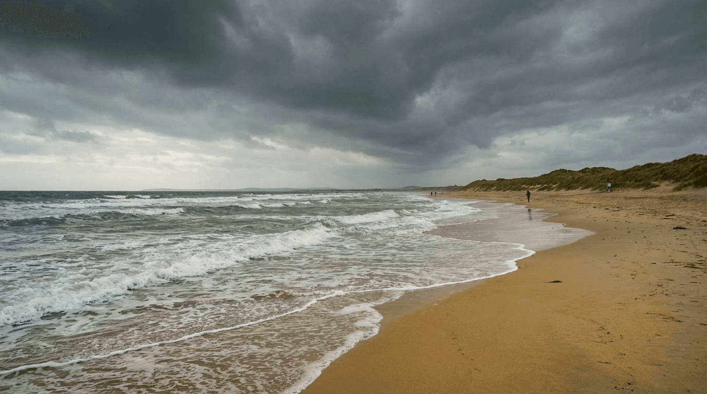 Dramatic cloudy sky over Curracloe Beach with waves rolling in, similar lighting to Saving Private Ryan scenes