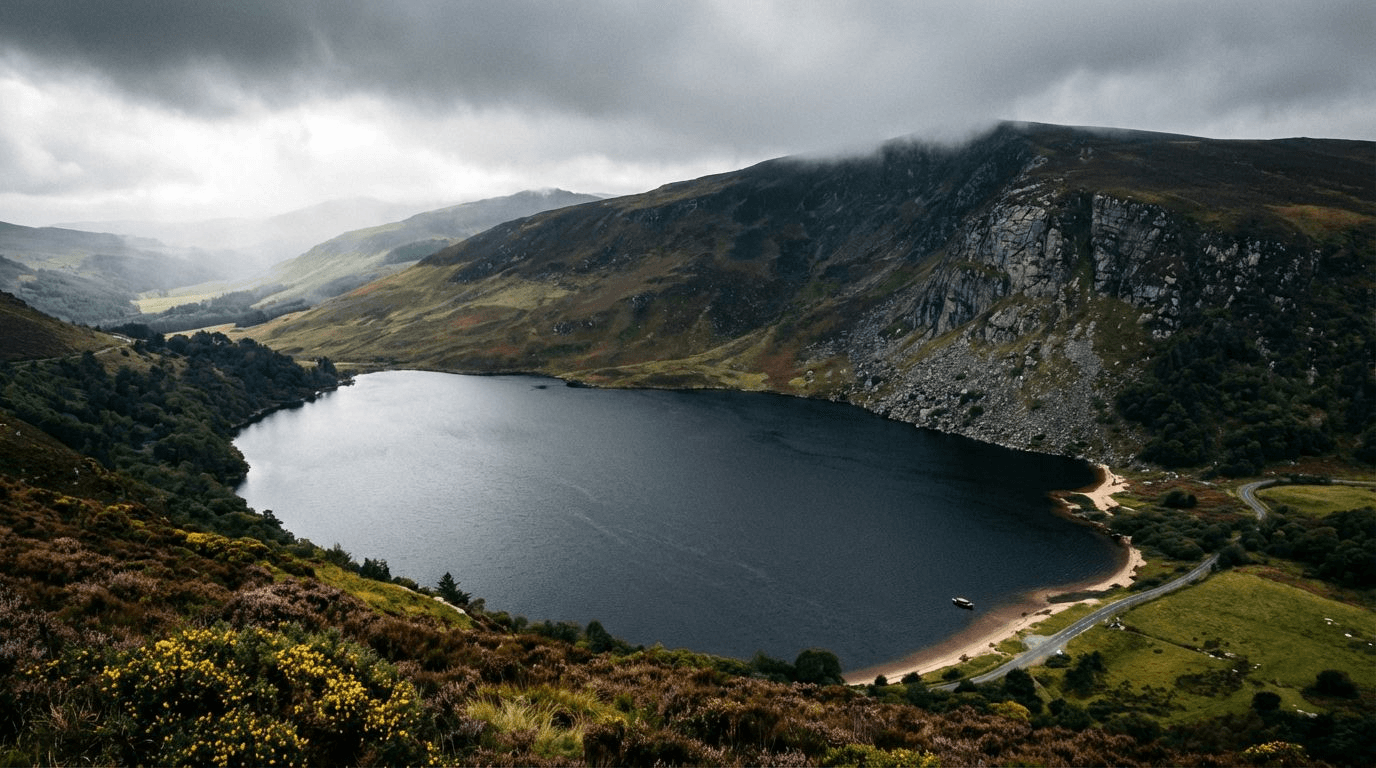 Lough Tay lake surrounded by Wicklow mountains, showing the dramatic landscape that resembles a Norwegian fjord